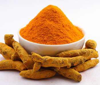 Turmeric powder, dried roots, white bowl traceable premium SoilSaga Naturals